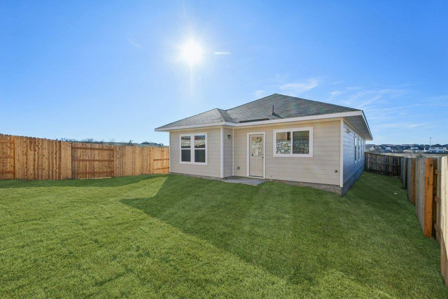 Rear of Home and Private Backyard