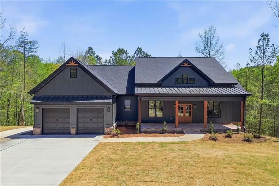 Front exterior of a new home in , Talking Rock, GA, highlighting curb appeal (Image 1). Front exterior of a new home in , Talking Rock, GA, highlighting curb appeal (Image 1).