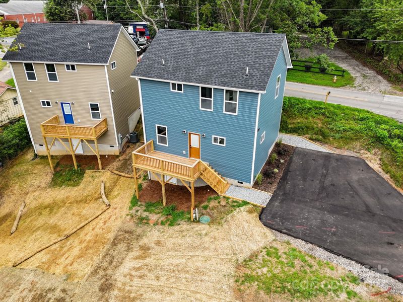 Front exterior of a new home in , Asheville, NC, highlighting curb appeal (Image 24).