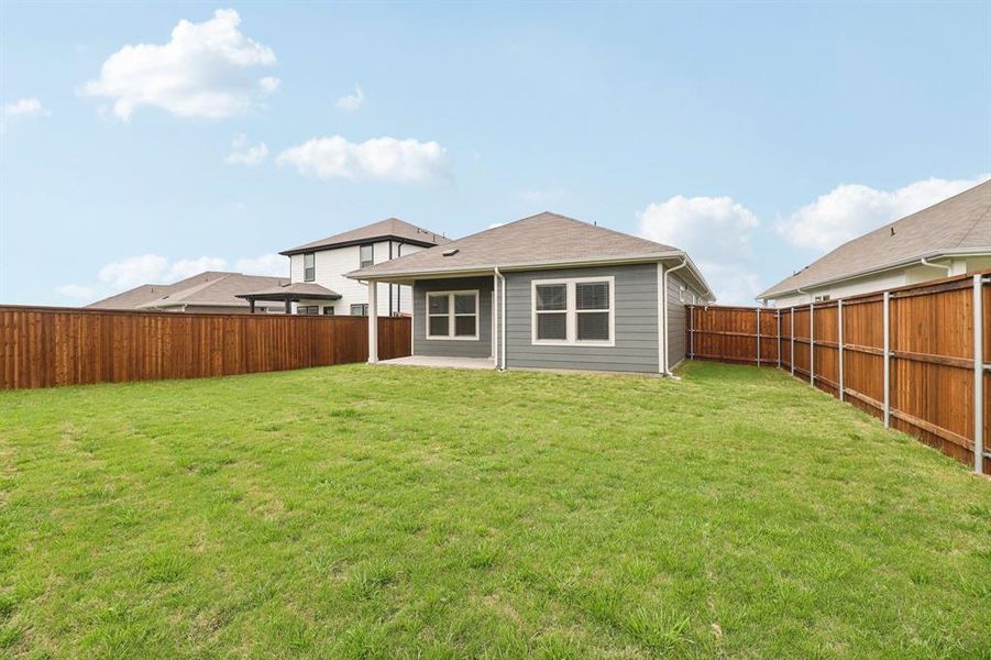 Exterior details and patio area of a home in Lakehaven - Spring Series, Farmersville (Image 23). Exterior details and patio area of a home in Lakehaven - Spring Series, Farmersville (Image 23).