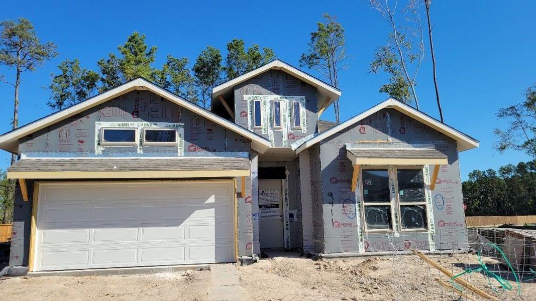 In-progress construction of a new home in The Highlands 50', Porter, TX (Image 8).