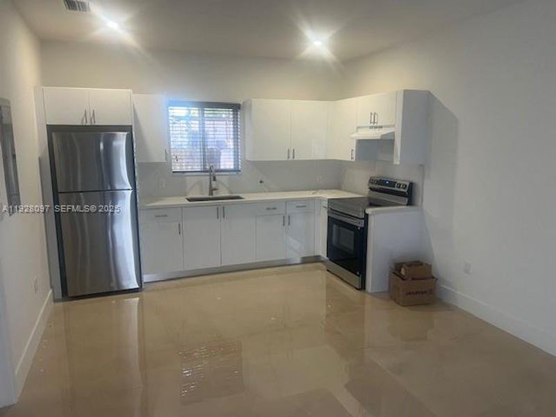 Furnished interior view inside a new home in , Miami (Image 11).