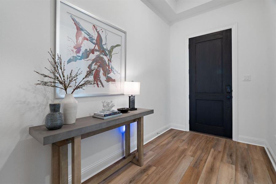 Step inside and you are greeted by a wide foyer. Step inside and you are greeted by a wide foyer.