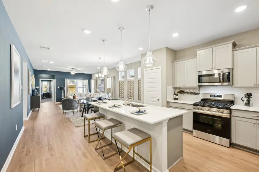 Oakshire II- Kitchen & Family. Sample image for illustration; upgrades, options, and colors may vary. Oakshire II- Kitchen & Family. Sample image for illustration; upgrades, options, and colors may vary.