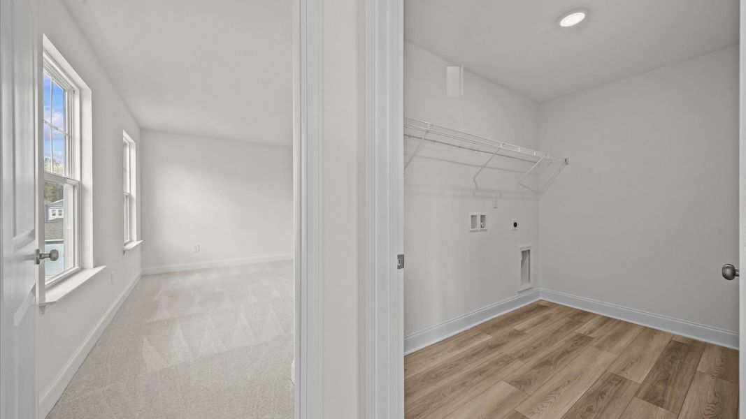 Representative furnished interior of a home built from the Jasmine by DRB Homes in Essex Village, Franklinton (Image 28).