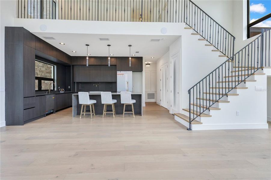Chef's kitchen with custom cabinetry and stunning countertops