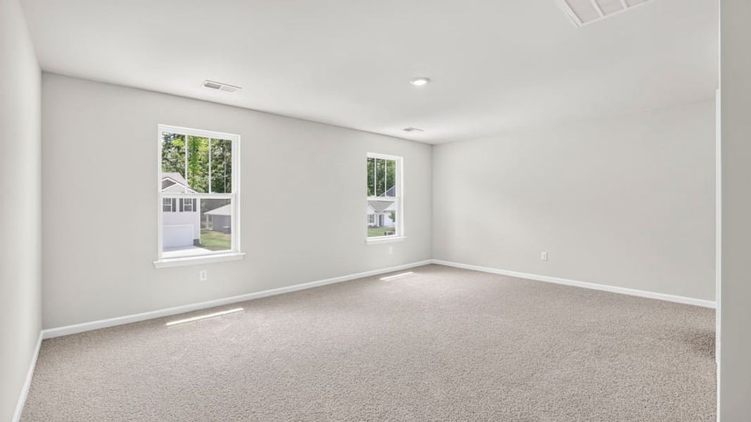 Spacious, unfurnished interior of a new home in Bentley Park, Greenwood (Image 30).