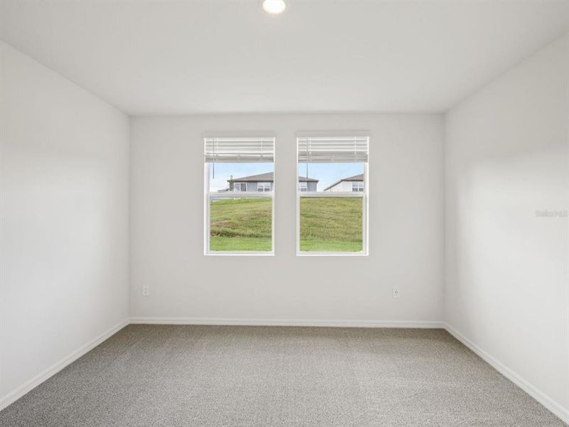 Spacious, unfurnished interior of a new home in The Reserve at Van Oaks, Auburndale (Image 8).