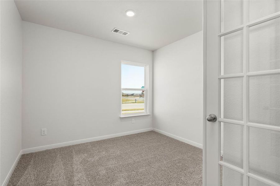 Spare room featuring carpet flooring and recessed lighting Spare room featuring carpet flooring and recessed lighting