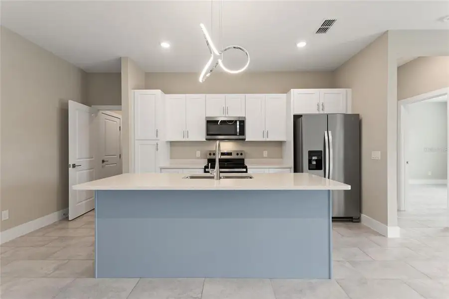 Furnished interior view inside a new home in , Kissimmee (Image 5).