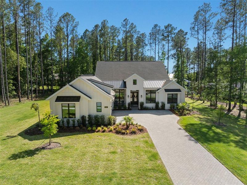 Front exterior of a new home in , Brooksville, FL, highlighting curb appeal (Image 27).