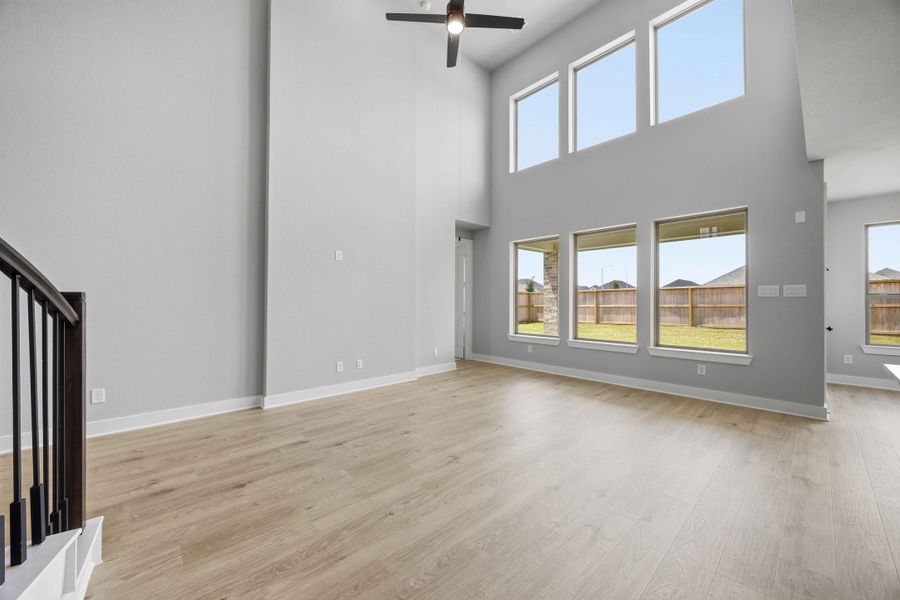 Spacious, unfurnished interior of a new home in Sunterra 50s, Katy (Image 28).
