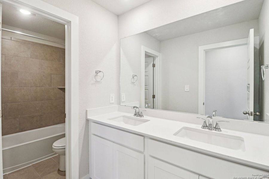 Furnished interior view inside a new home in Legendary Trails - Premier Series, Cibolo (Image 6).