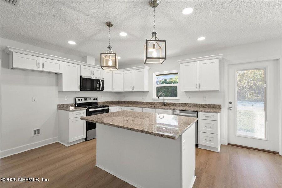 Furnished interior view inside a new home in , Starke (Image 6). Furnished interior view inside a new home in , Starke (Image 6).