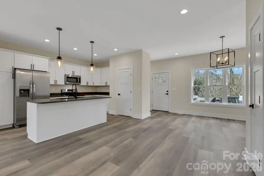 Stainless appliances and modern fixtures