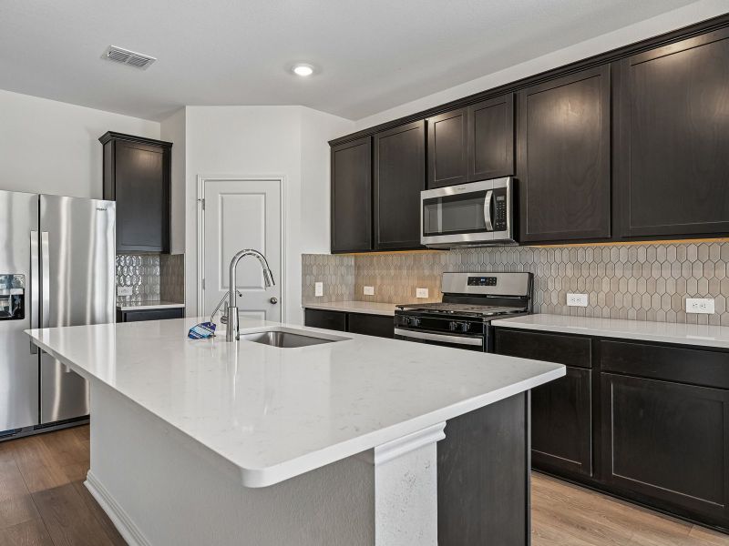Furnished interior view inside a new home in Travena - Reserve Collection, Georgetown (Image 4).