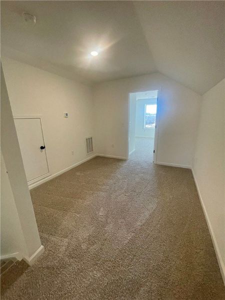 Spacious, unfurnished interior of a new home in Springwood Grove, Central (Image 24).