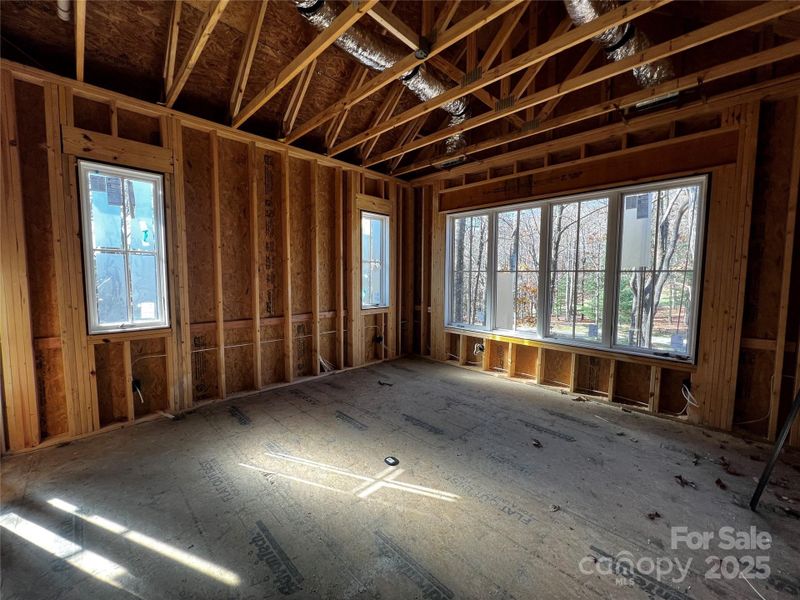 A sprawling primary suite is situated on the main level A sprawling primary suite is situated on the main level