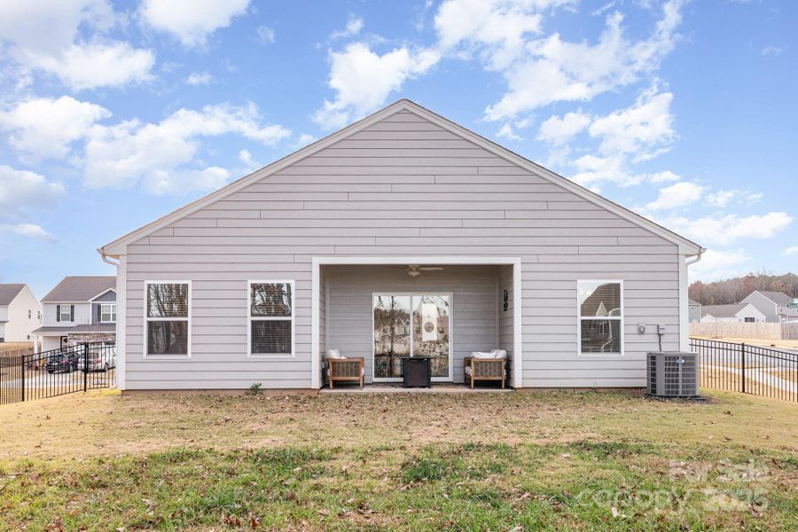 Exterior details and patio area of a home in , Troutman (Image 3).