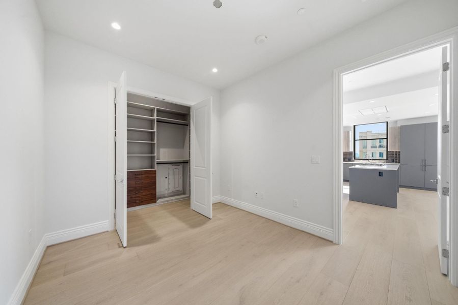 Third bedroom/Flex room: This versatile room, offers a perfect quiet retreat, with its cozy atmosphere. Features its own upgraded custom closet system Third bedroom/Flex room: This versatile room, offers a perfect quiet retreat, with its cozy atmosphere. Features its own upgraded custom closet system