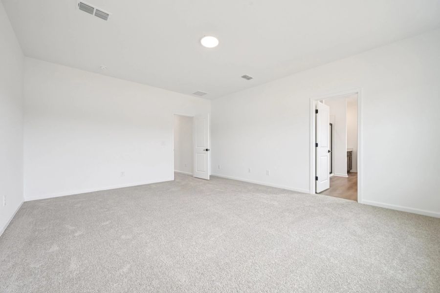 Primary Bedroom featuring AW Collection® Oxford - Calming flow with grounded sophistication. Primary Bedroom featuring AW Collection® Oxford - Calming flow with grounded sophistication.