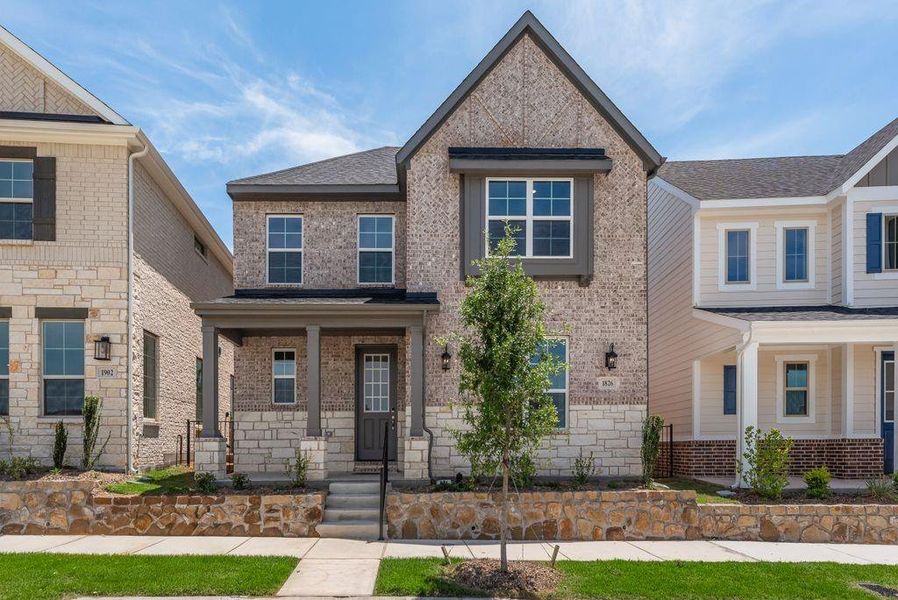 Front exterior of a new home in Bayside, Rowlett, TX, highlighting curb appeal (Image 2). Front exterior of a new home in Bayside, Rowlett, TX, highlighting curb appeal (Image 2).