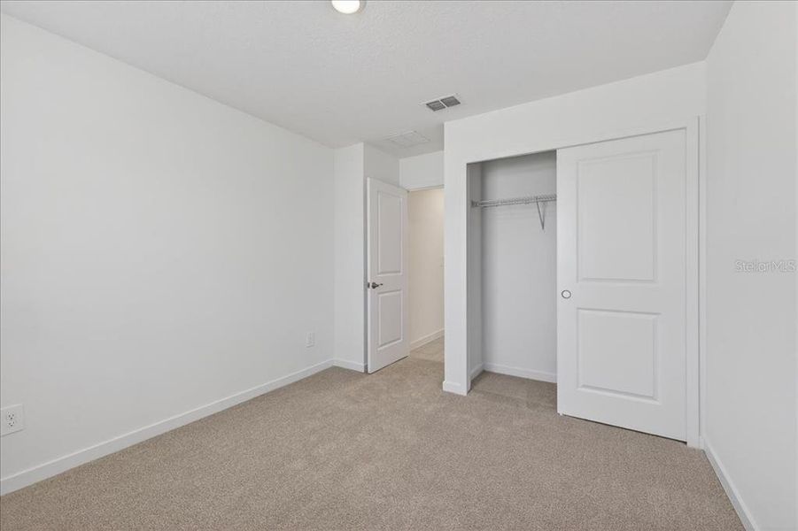 Spacious, unfurnished interior of a new home in Colbert Landings, Palm Coast (Image 19).