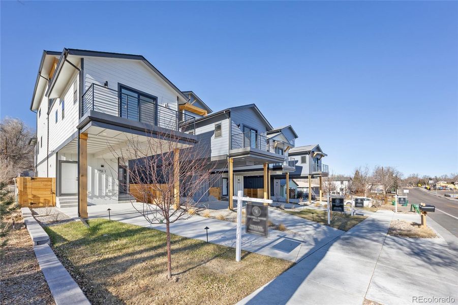 Front exterior of a new home in , Denver, CO, highlighting curb appeal (Image 25).