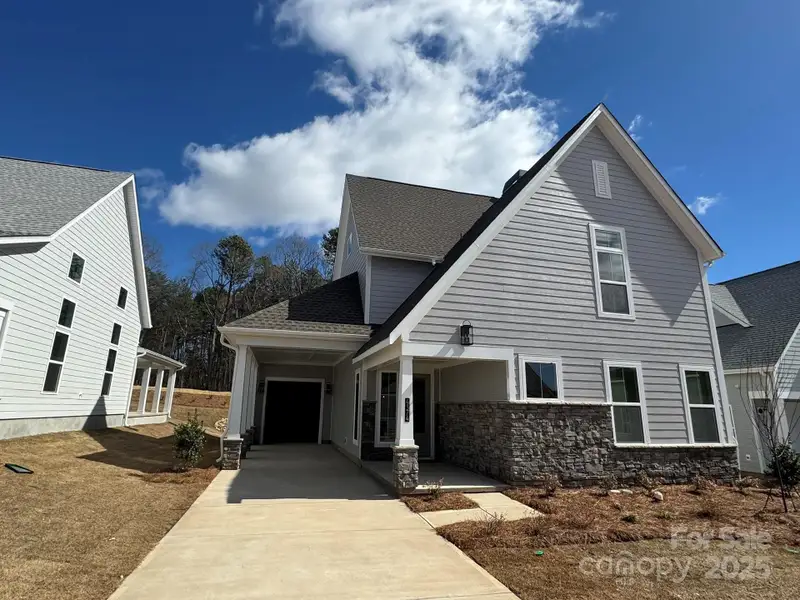 Front exterior of a new home in Lakeside Pointe, Sherrills Ford, NC, highlighting curb appeal (Image 2).