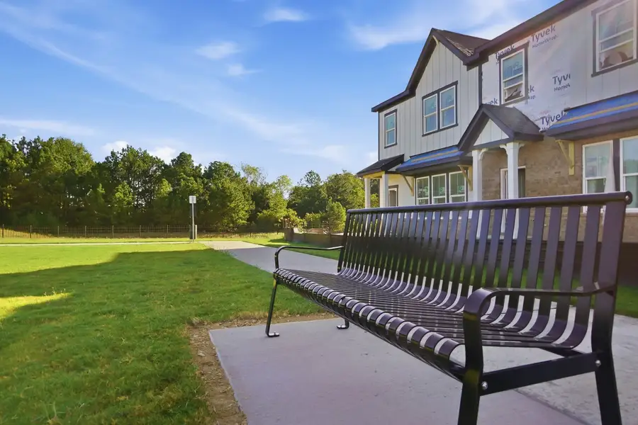 Exterior details and patio area of a home in Indian Trail Townhomes, Indian Trail (Image 4).