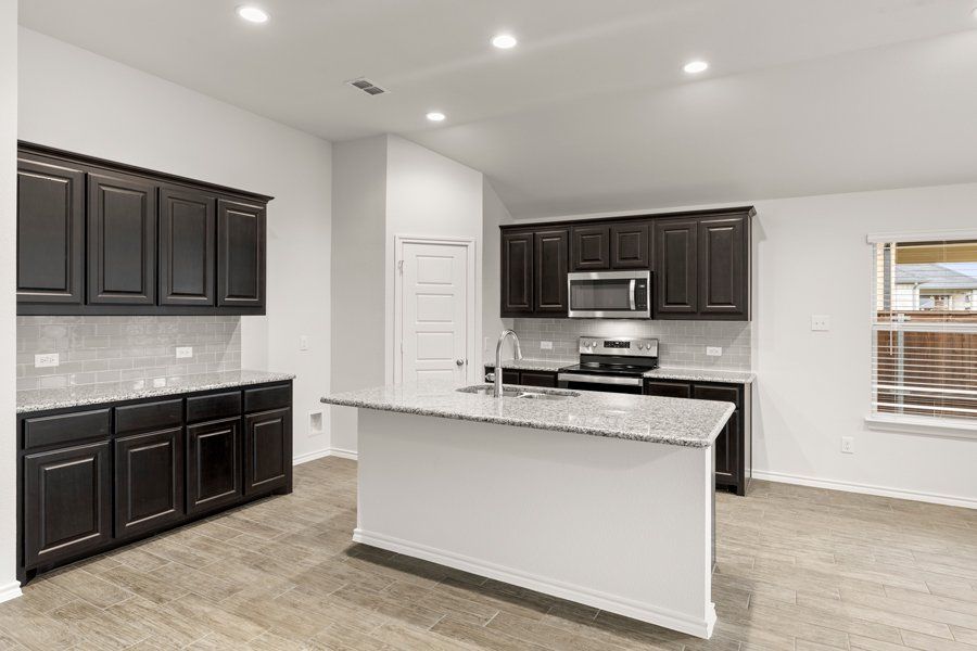 Representative exterior photo of a completed home built from the Cheyenne by Impression Homes in DeBerry Reserve, Royse City, TX (Image 5).