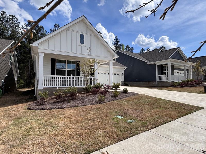 Front exterior of a new home in Westport Freedom Series, York, SC, highlighting curb appeal (Image 21).
