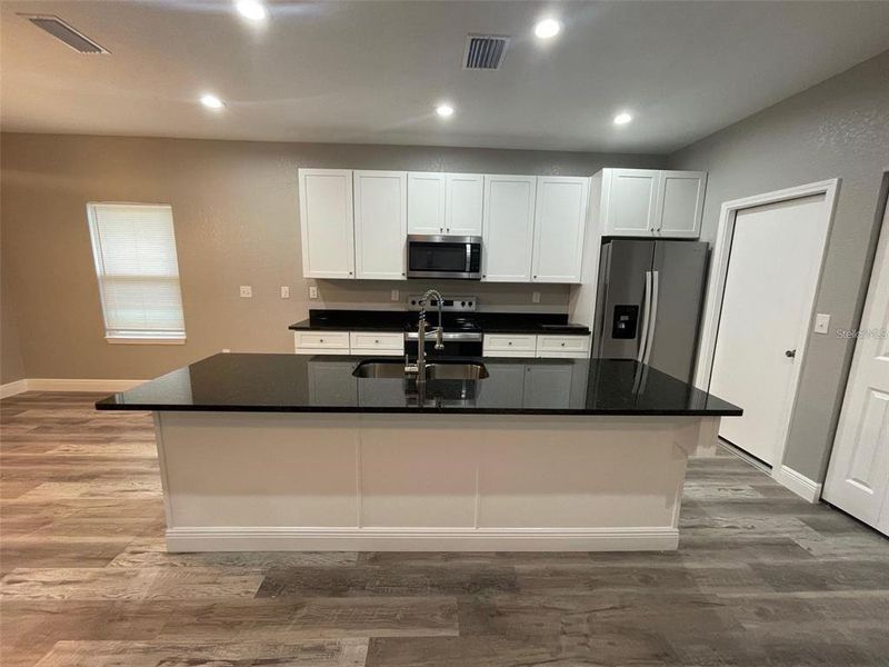 Furnished interior view inside a new home in , Gainesville (Image 7).