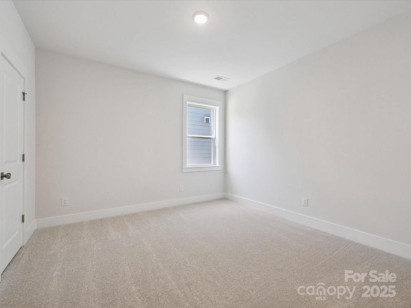 Spacious, unfurnished interior of a new home in North Creek Village, Huntersville (Image 27).