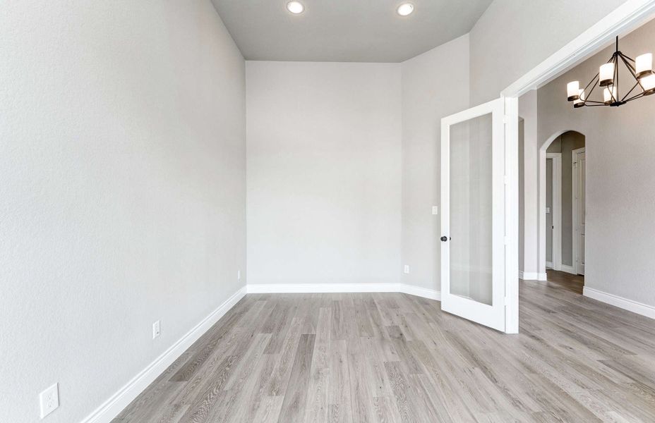 Representative unfurnished interior of a home built from the 2870 by Ravenna Homes in The Woodlands Hills 65′, Willis (Image 21). Representative unfurnished interior of a home built from the 2870 by Ravenna Homes in The Woodlands Hills 65′, Willis (Image 21).