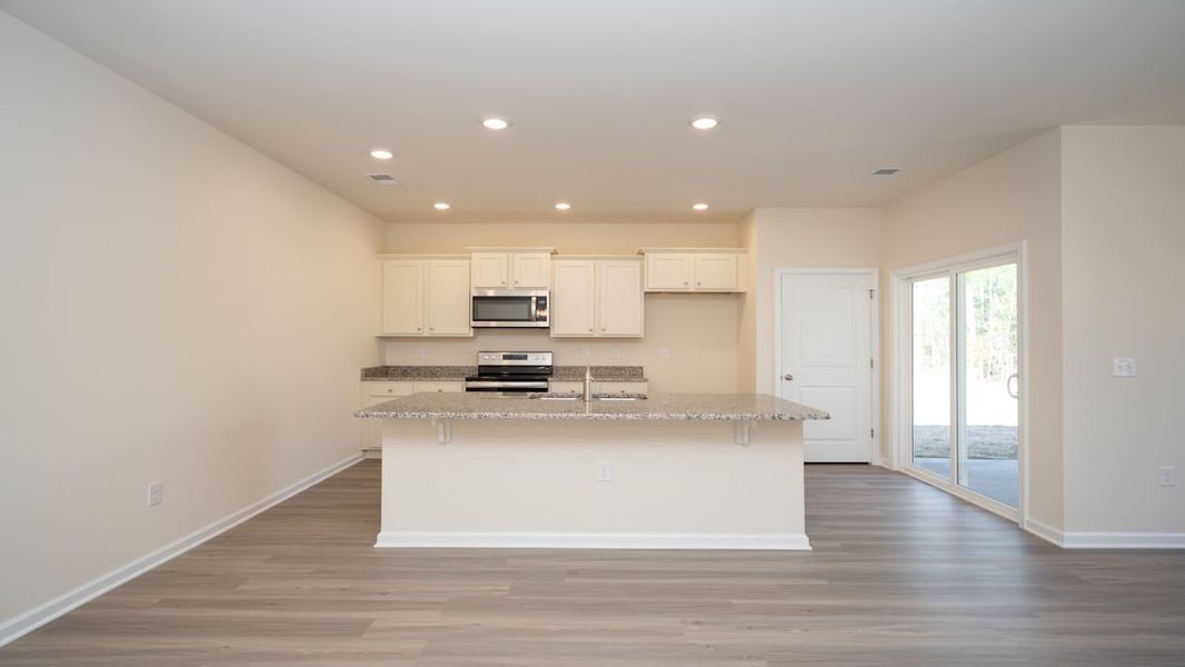 Representative furnished interior of a home built from the KERRY by D.R. Horton in The Reserve at Wild Horse, Conway (Image 8).
