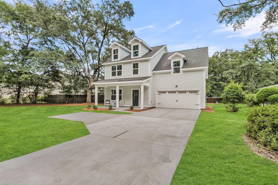 Front exterior of a new home in , Johns Island, SC, highlighting curb appeal (Image 26). Front exterior of a new home in , Johns Island, SC, highlighting curb appeal (Image 26).