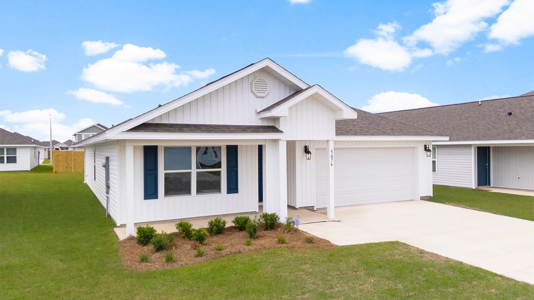 Front exterior of a new home in Titus Park, Panama City, FL, highlighting curb appeal (Image 14). Front exterior of a new home in Titus Park, Panama City, FL, highlighting curb appeal (Image 14).