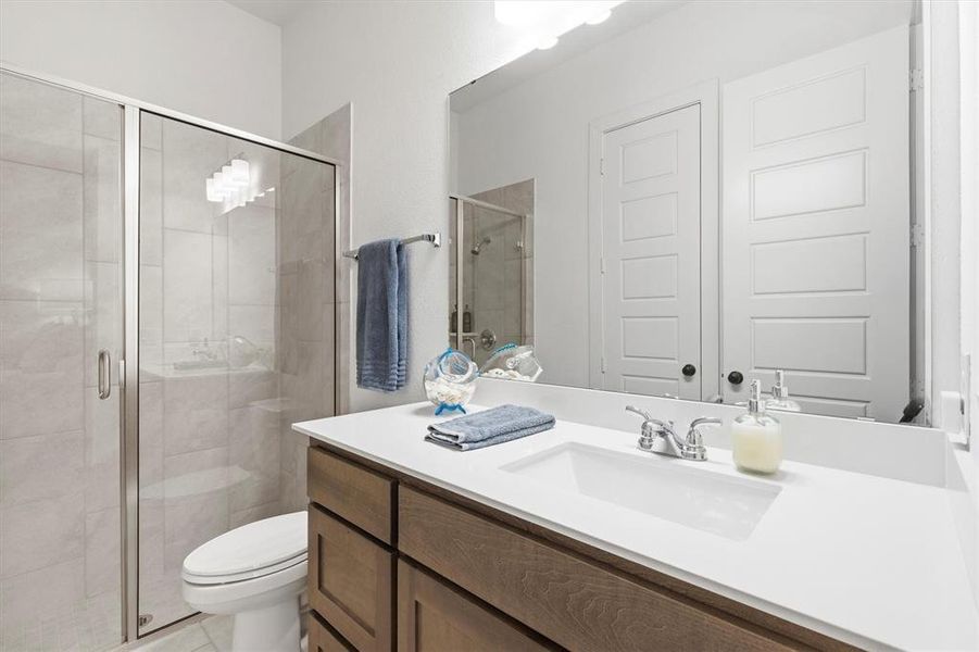 Bedroom #4 ensuite bathroom with walk in shower.