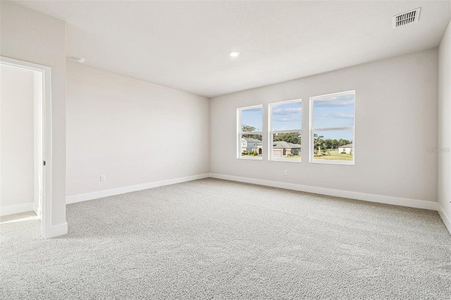 Spacious, unfurnished interior of a new home in Waterset Tradition Series, Apollo Beach (Image 28).