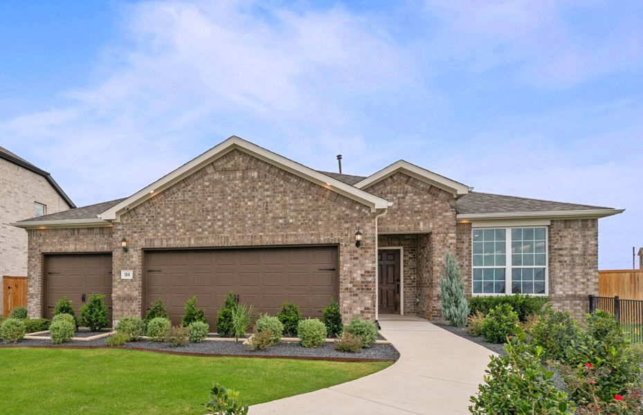 Representative exterior photo of a completed home built from the Burnet by Pulte Homes in Saddleback at Santa Rita Ranch, Liberty Hill, TX (Image 22). Representative exterior photo of a completed home built from the Burnet by Pulte Homes in Saddleback at Santa Rita Ranch, Liberty Hill, TX (Image 22).