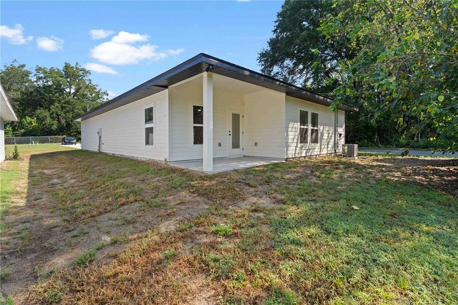 Front exterior of a new home in , Alachua, FL, highlighting curb appeal (Image 2).