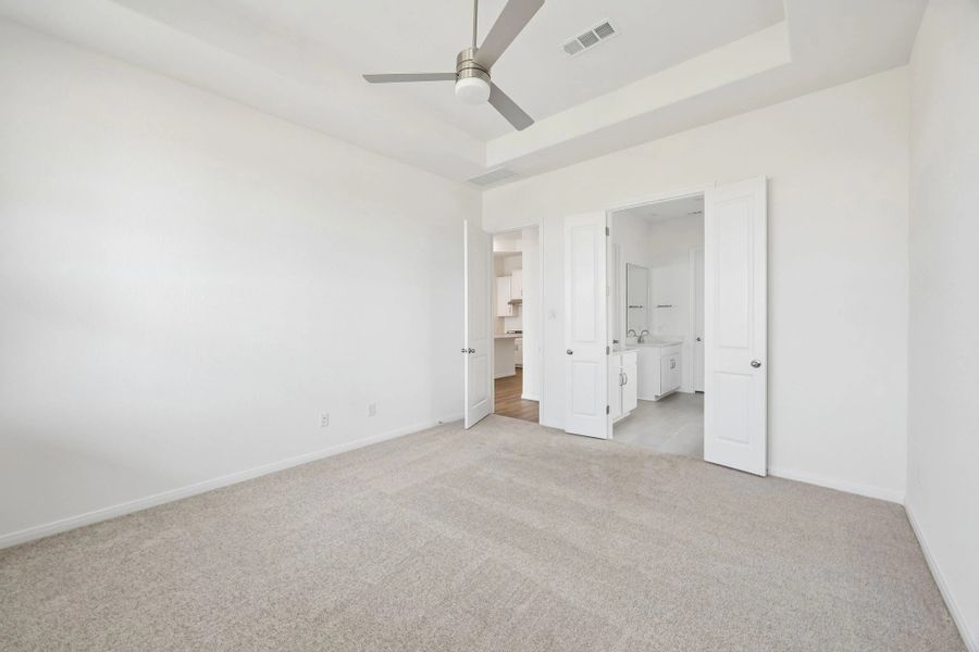 Primary bedroom. Sample product photo. Actual exterior and interior selections may vary by homesite. Photo may be virtually staged.