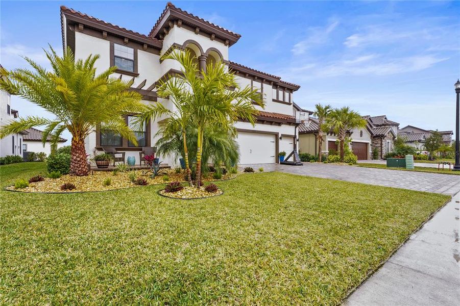 Front exterior of a new home in , Parrish, FL, highlighting curb appeal (Image 21).