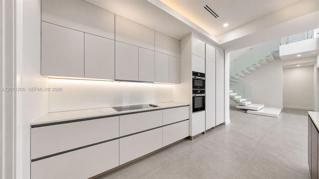 Furnished interior view inside a new home in , Miami Lakes (Image 62).