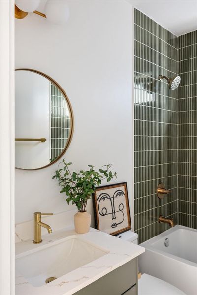 Bathroom with vanity and shower / washtub combination Bathroom with vanity and shower / washtub combination
