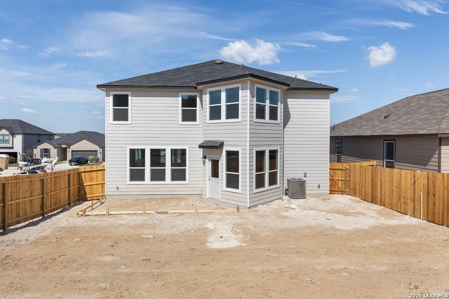 Exterior details and patio area of a home in Hidden Bluffs at TRP, San Antonio (Image 3).