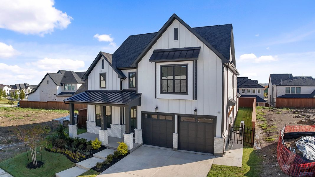 Front exterior of a new home in Fields - 50' Lots, Frisco, TX, highlighting curb appeal (Image 1). Front exterior of a new home in Fields - 50' Lots, Frisco, TX, highlighting curb appeal (Image 1).