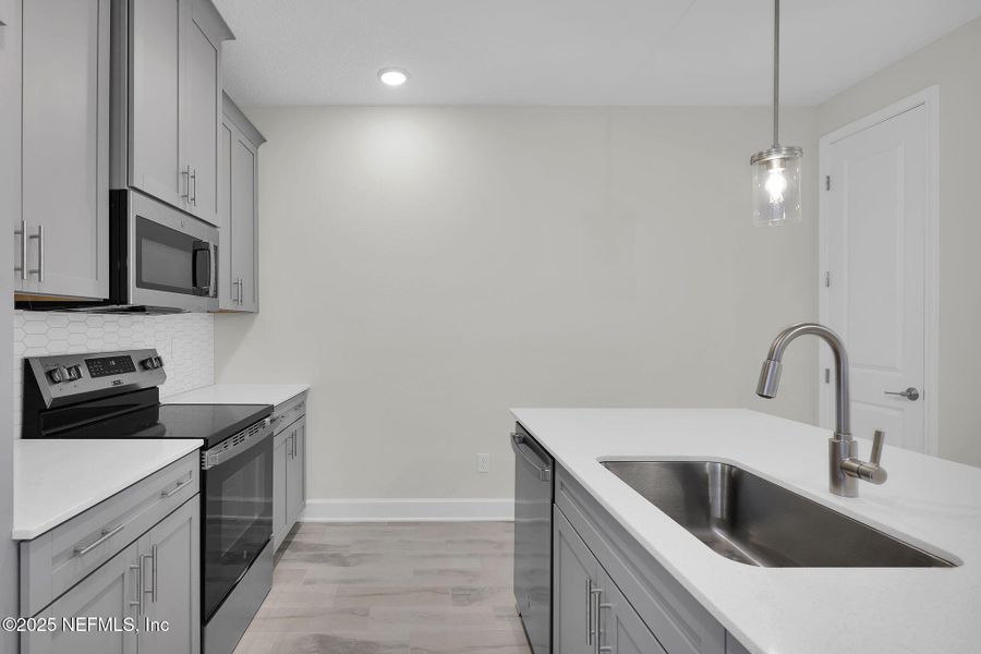 Furnished interior view inside a new home in Woodland Park, Nocatee (Image 7).