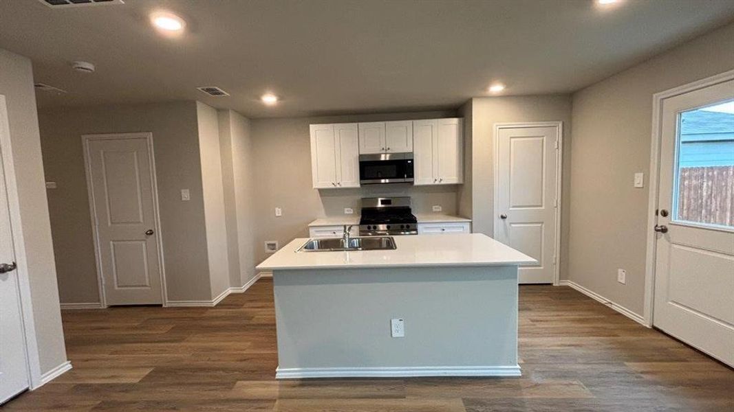 Kitchen- All Home and community information, including pricing, included features, terms, availability and amenities, are subject to change at any time without notice or obligation. All Drawings, pictures, photographs, video, square footages, floor plans, elevations, features, colors and sizes are approximate for illustration purposes only and will vary from the homes as built.